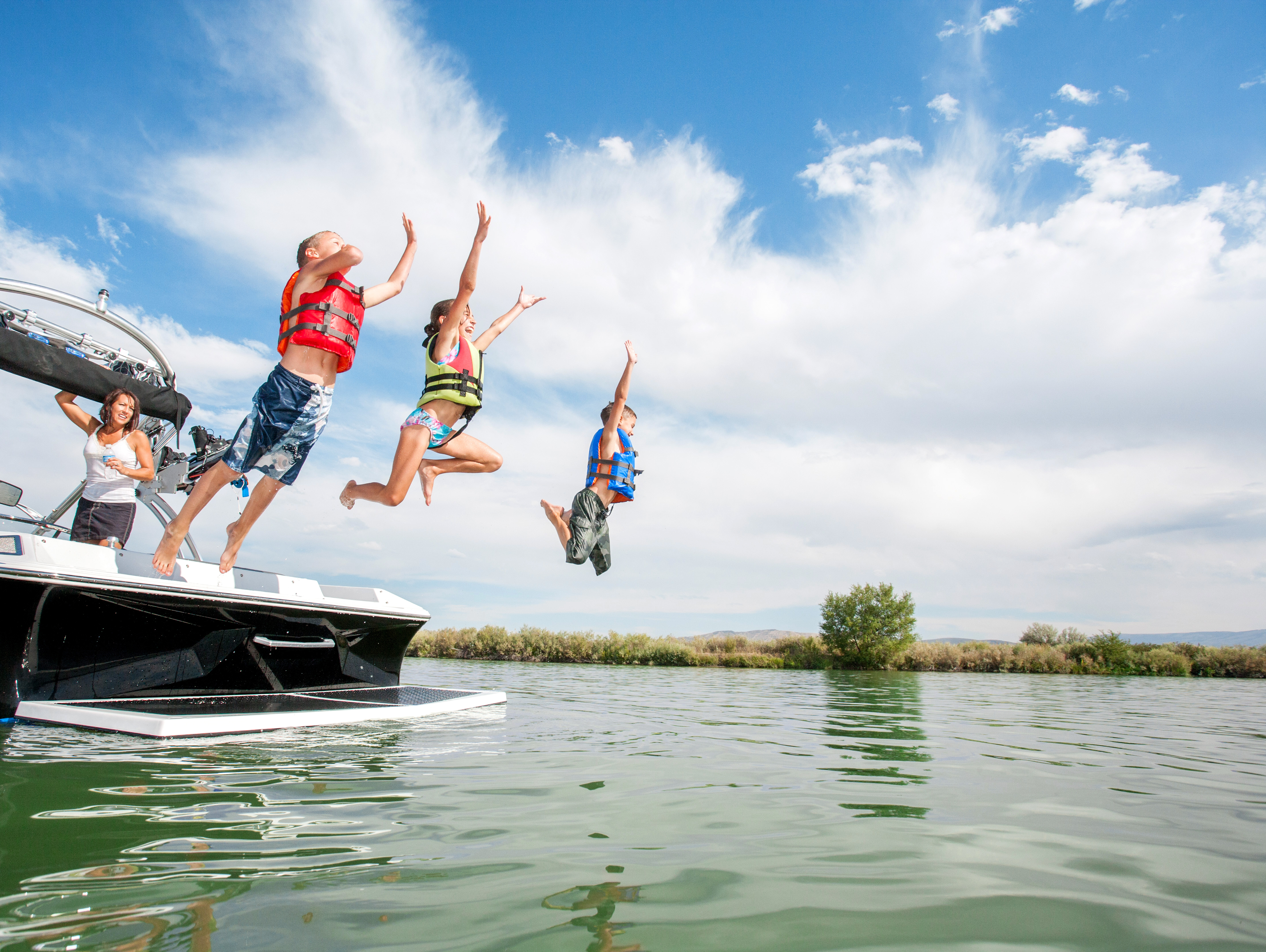 A family goes on a summer boating excursion in an Ohio lake.