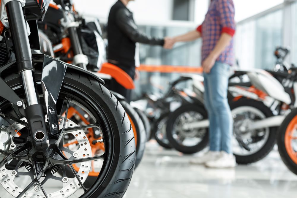 A man secures motorcycle financing and uses his loan to buy a bike in Ohio.