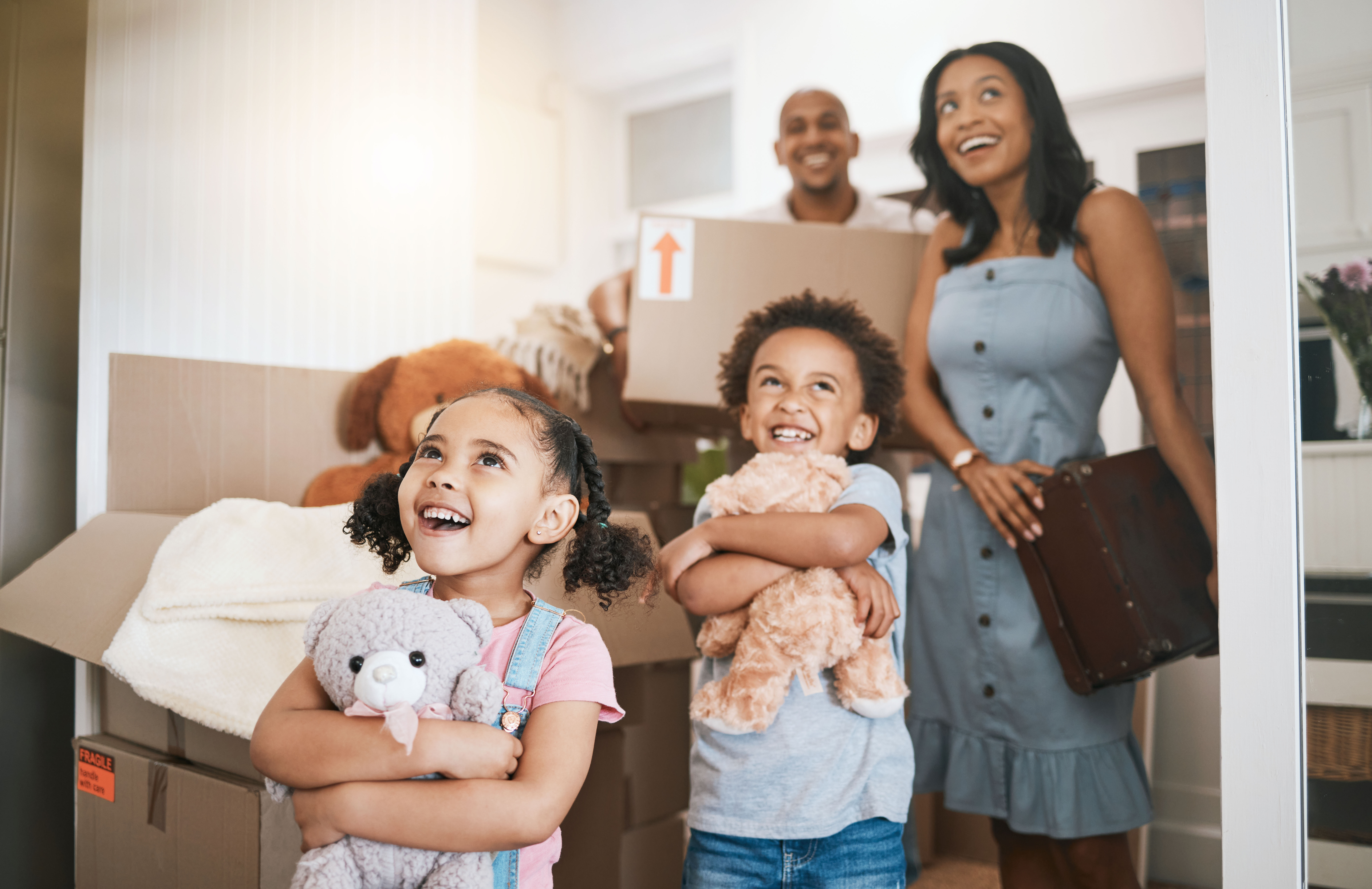 A family moves into a home with assistance from the OHFA financial education resources.