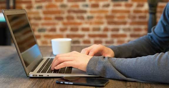 man applies online for home loan