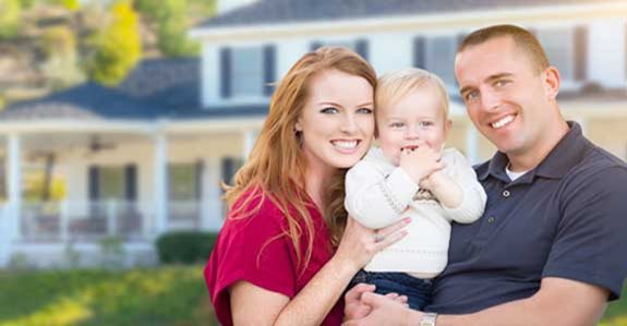 family with new home loan smiling